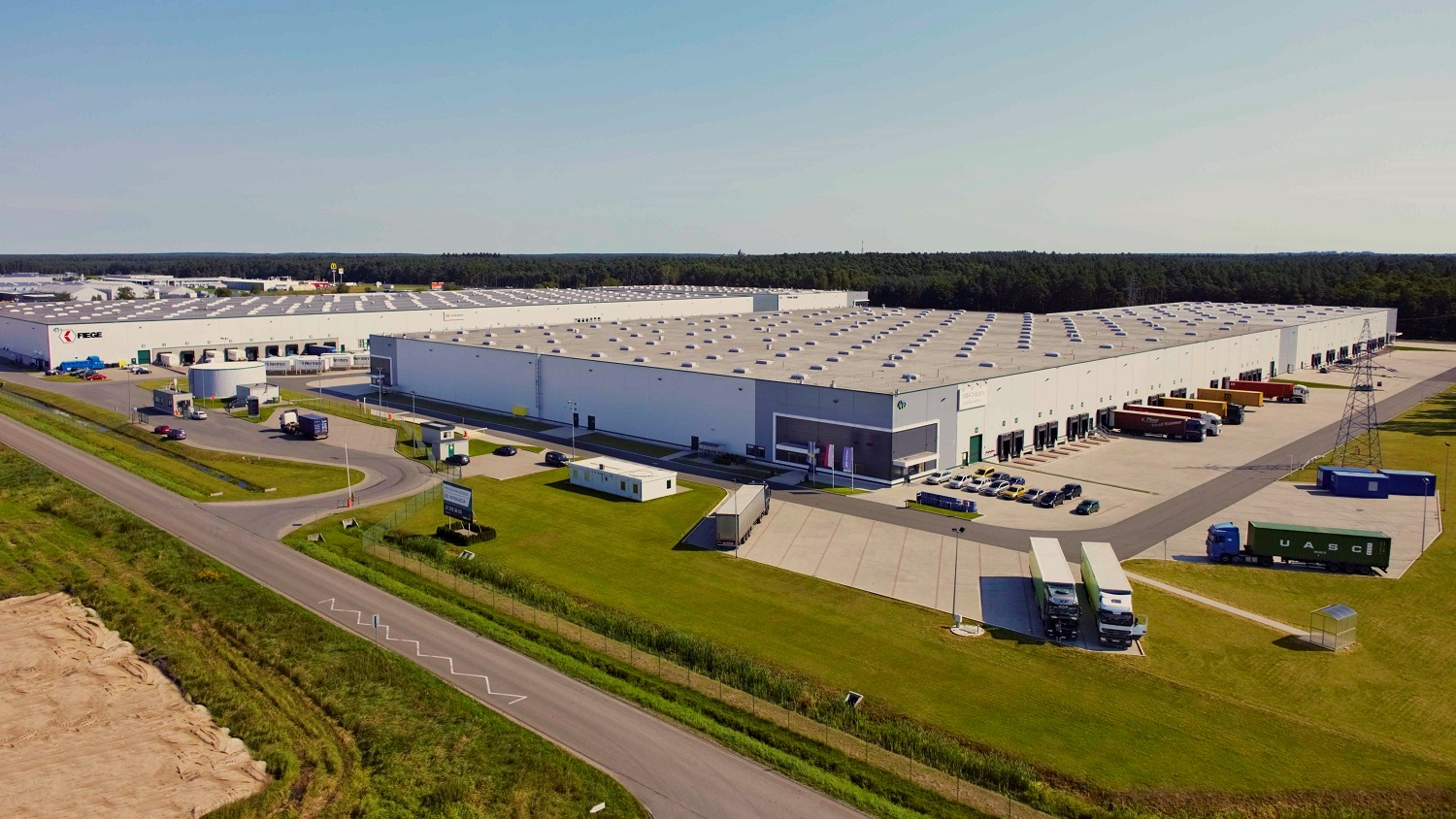 News Article Axi Immo industrial Poland summary warehouse